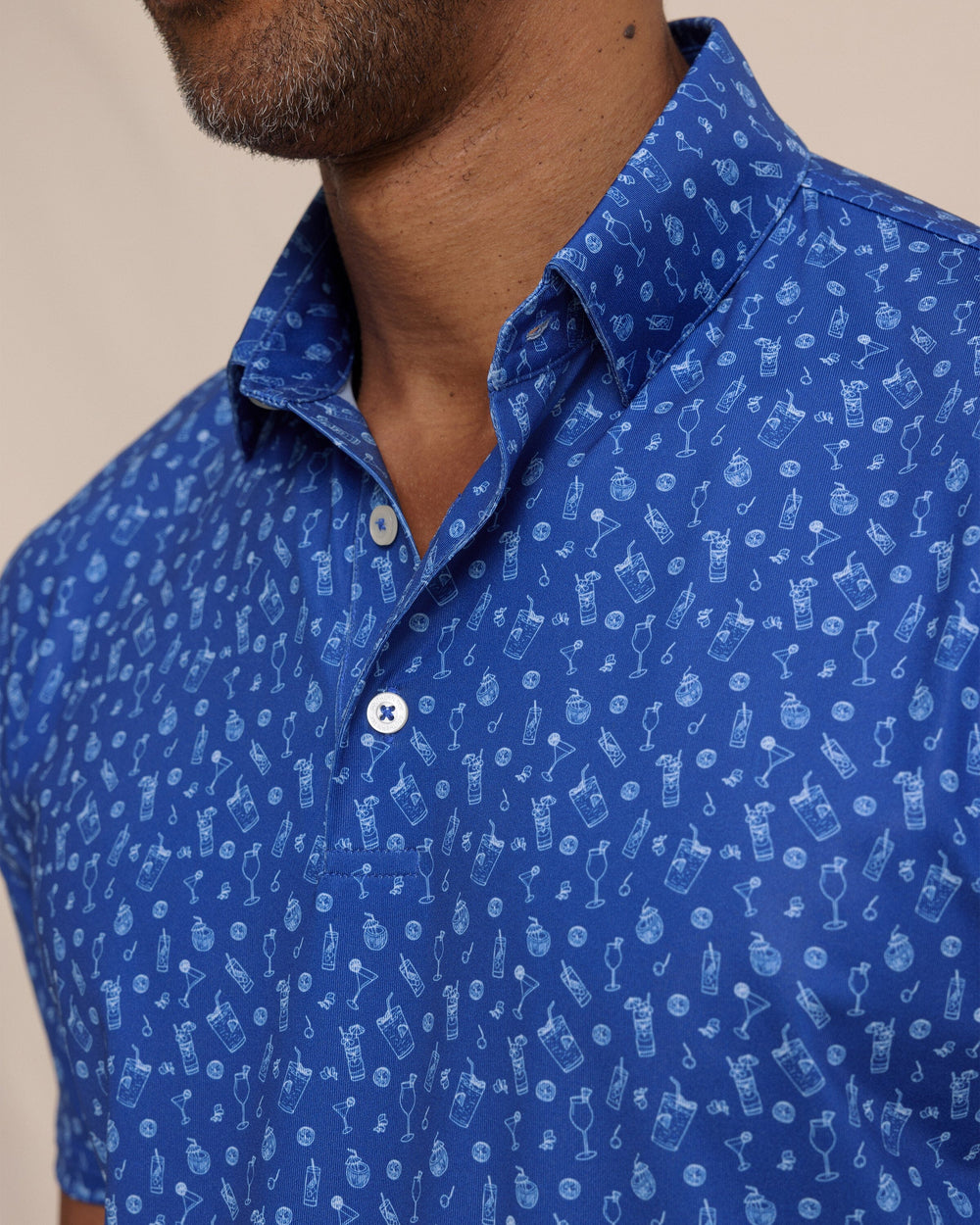 The detail view of the Southern Tide Driver Pour Decisions Printed Polo by Southern Tide - Surf Blue