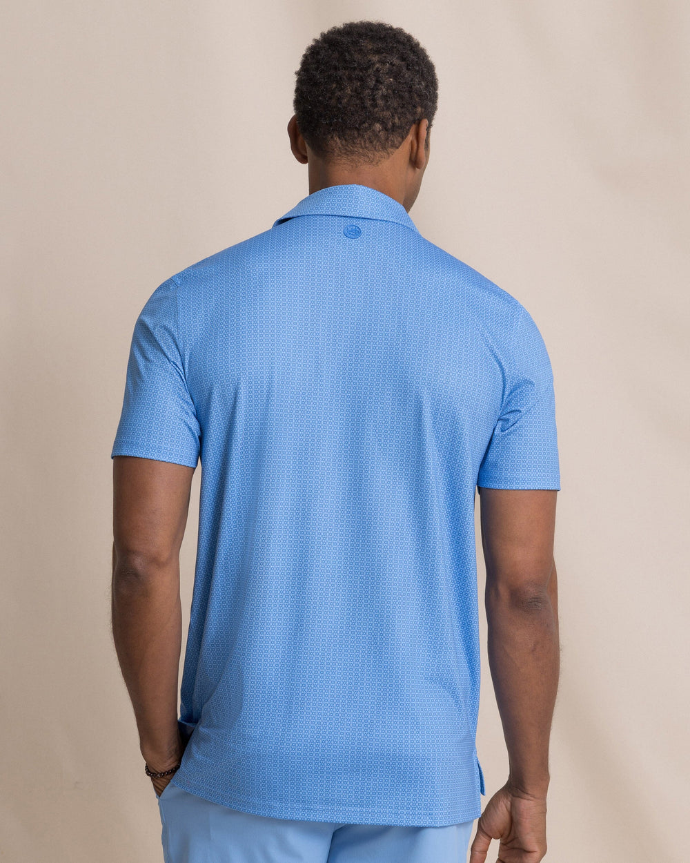 The back view of the Southern Tide Driver Seaside Geo Printed Polo by Southern Tide - Blue Stream