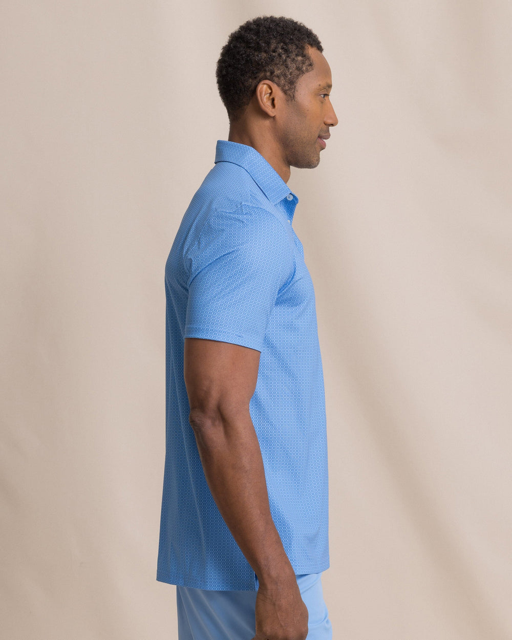 The side view of the Southern Tide Driver Seaside Geo Printed Polo by Southern Tide - Blue Stream