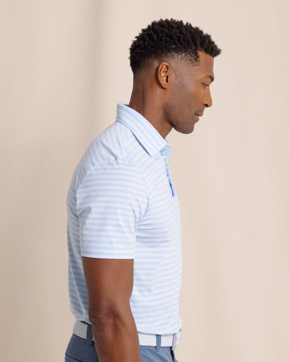 The side view of the Southern Tide Driver Sevilla Stripe Polo by Southern Tide - Cerulean