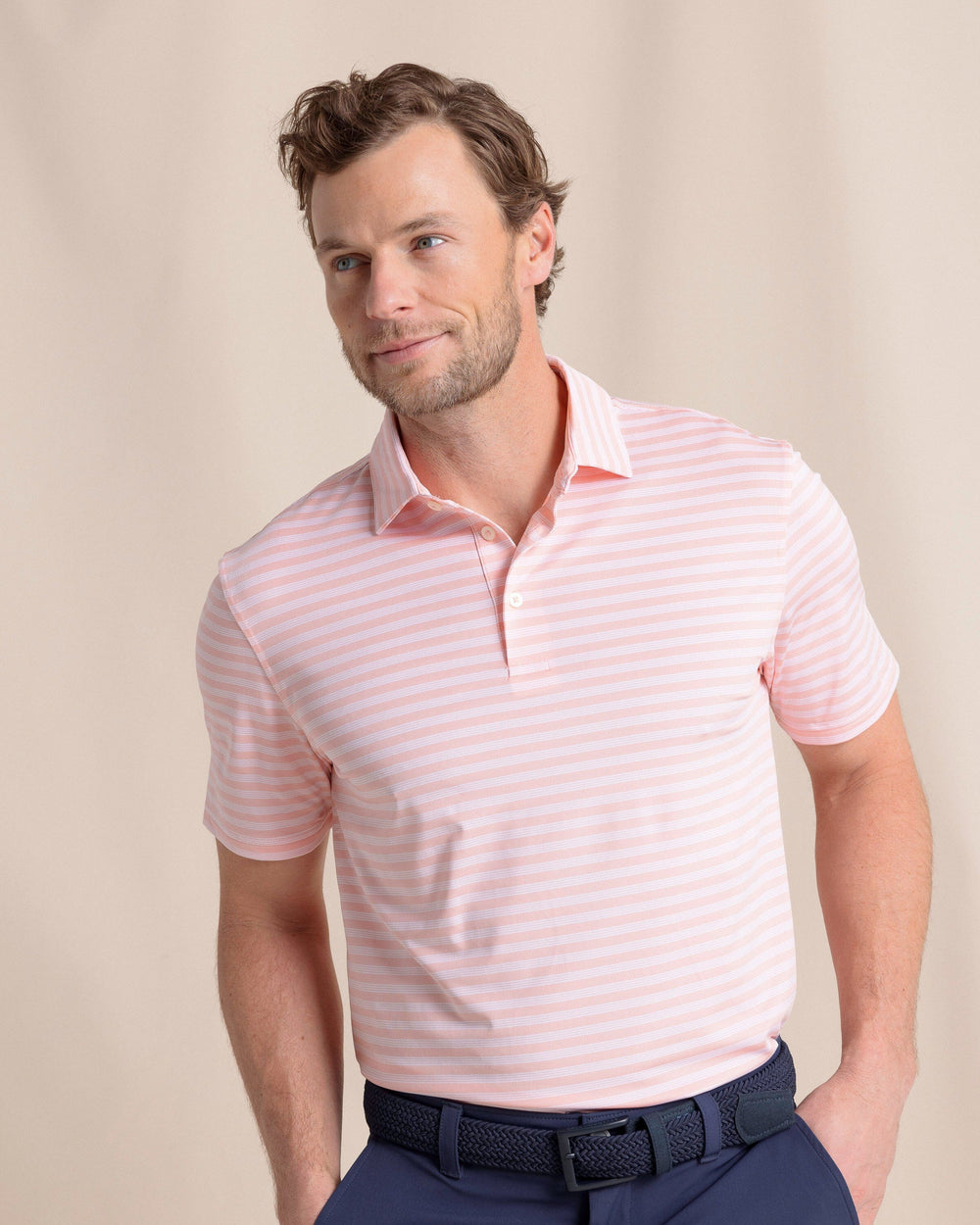 The front view of the Southern Tide Driver Sevilla Stripe Polo by Southern Tide - Petal Pink