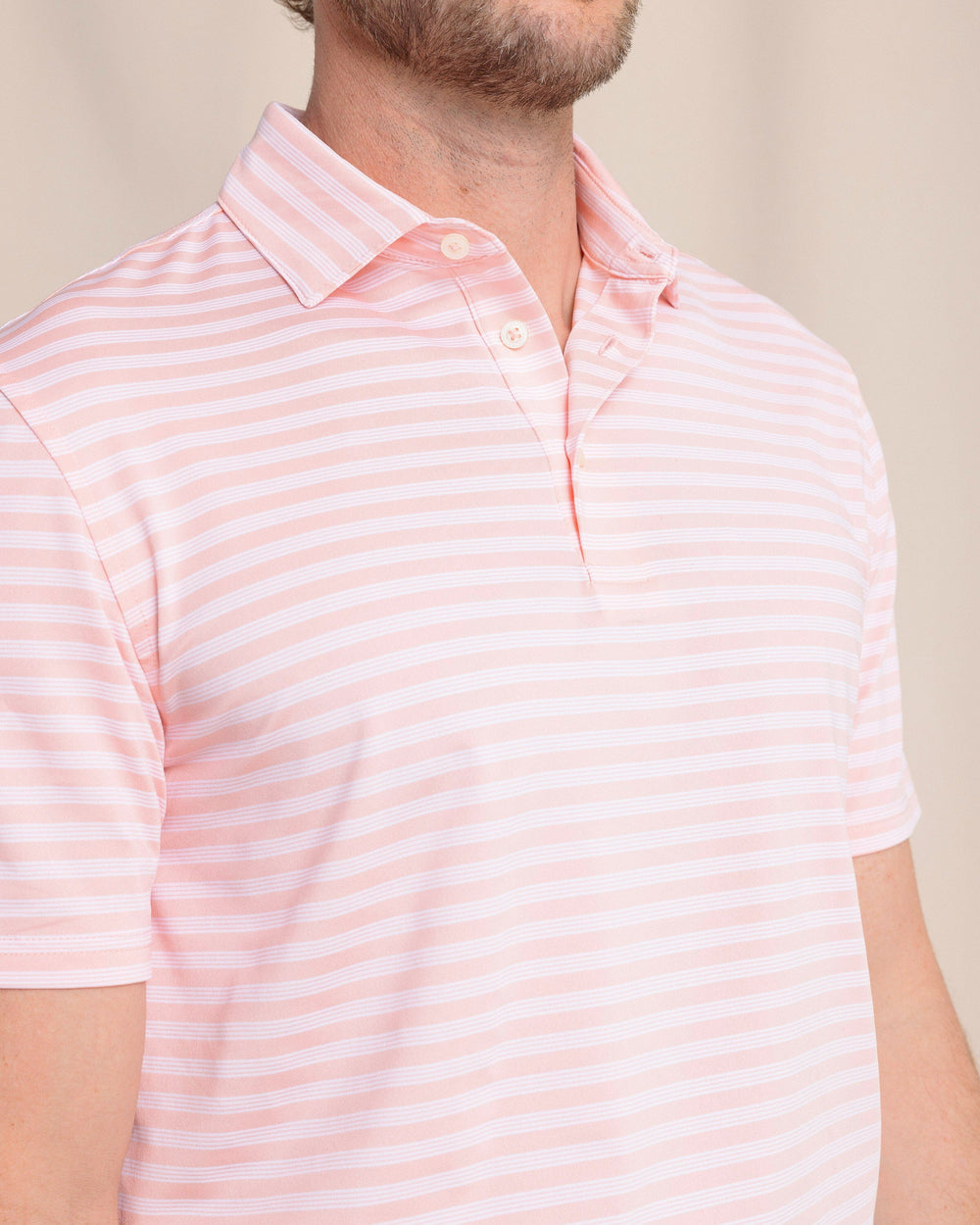 The front detail view of the Southern Tide Driver Sevilla Stripe Polo by Southern Tide - Petal Pink