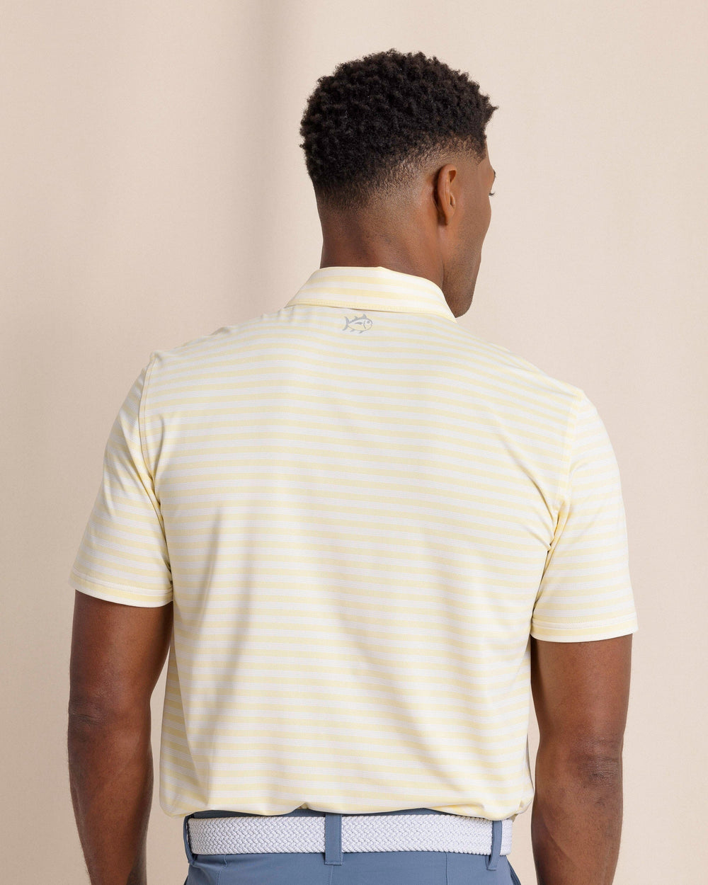 The back view of the Southern Tide Driver Sevilla Stripe Polo by Southern Tide - Tuscan Sun