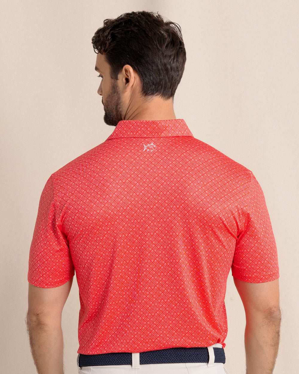 The back view of the Southern Tide Driver Snazzy Scales Printed Polo by Southern Tide - Poppy Red