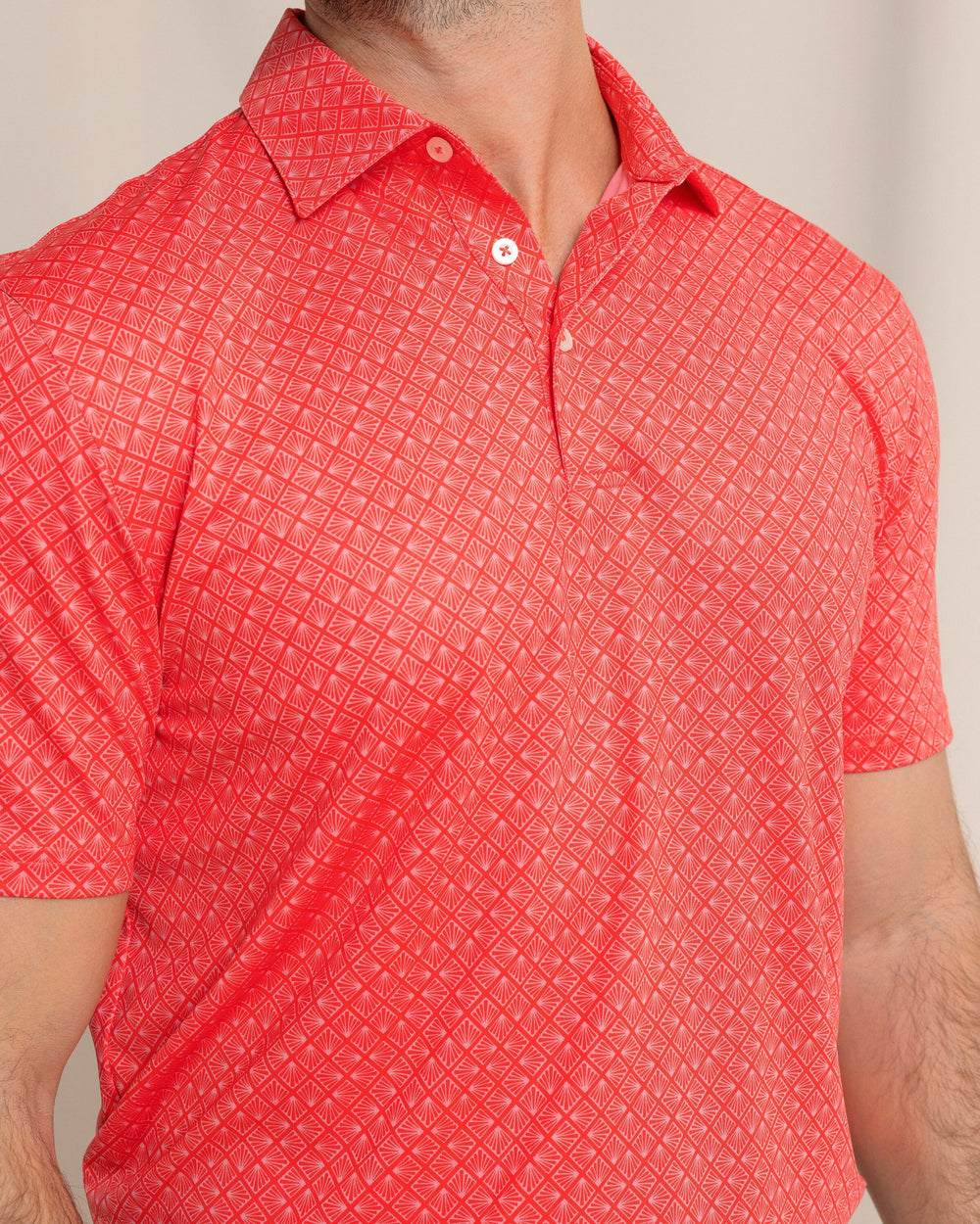 The front detail view of the Southern Tide Driver Snazzy Scales Printed Polo by Southern Tide - Poppy Red