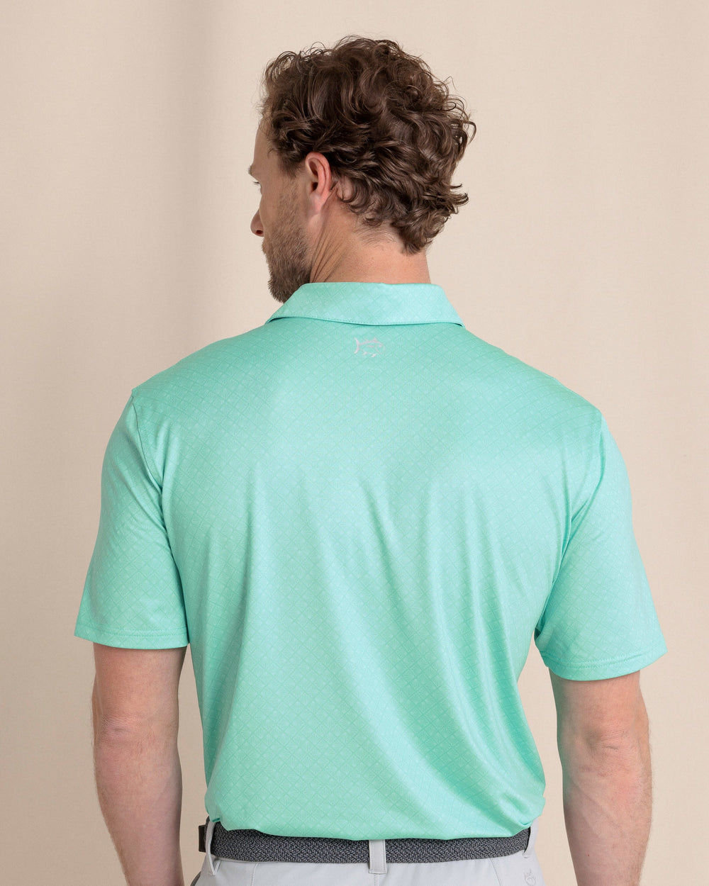 The back view of the Southern Tide Driver Snazzy Scales Printed Polo by Southern Tide - Turtle Green