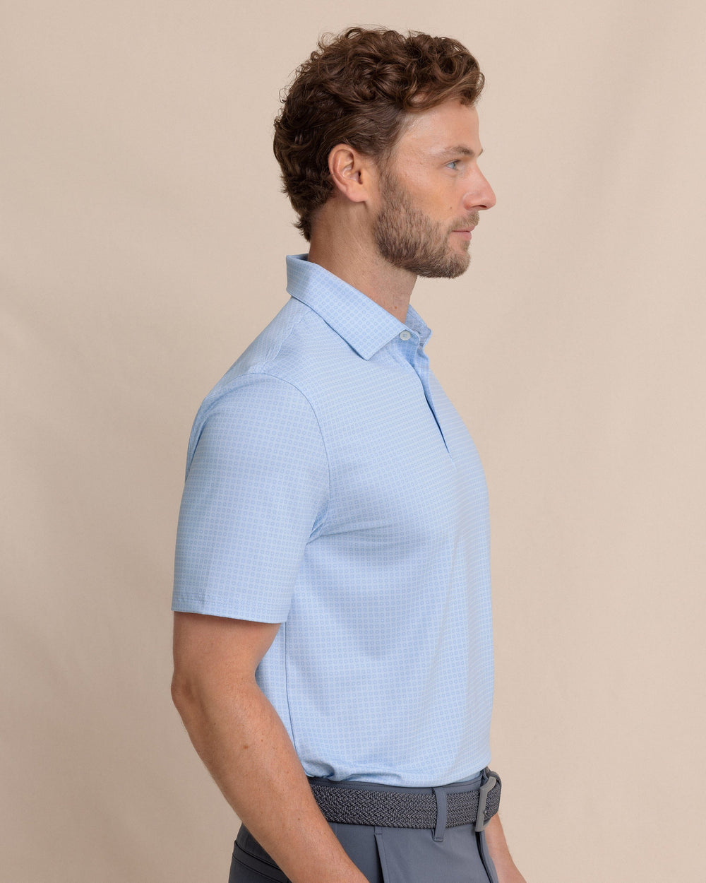 The side view of the Southern Tide Driver Spring Geo Printed Polo by Southern Tide - Cerulean