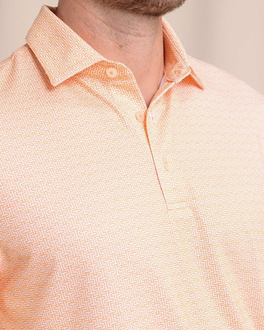 The front detail view of the Southern Tide Driver ST Geo Polo by Southern Tide - Cantaloupe