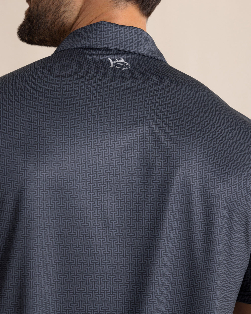 The detail view of the Southern Tide Driver ST Geo Printed Polo by Southern Tide - Caviar Black 