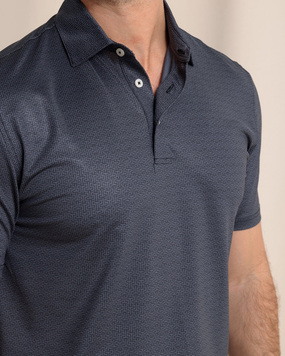 The detail view of the Southern Tide Driver ST Geo Printed Polo by Southern Tide - Caviar Black 