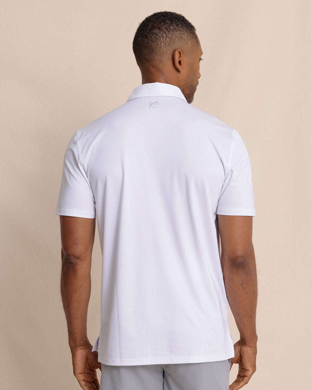 The back view of the Southern Tide Driver ST Geo Printed Polo by Southern Tide - Classic White