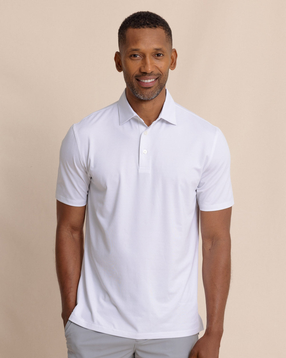 The front view of the Southern Tide Driver ST Geo Printed Polo by Southern Tide - Classic White