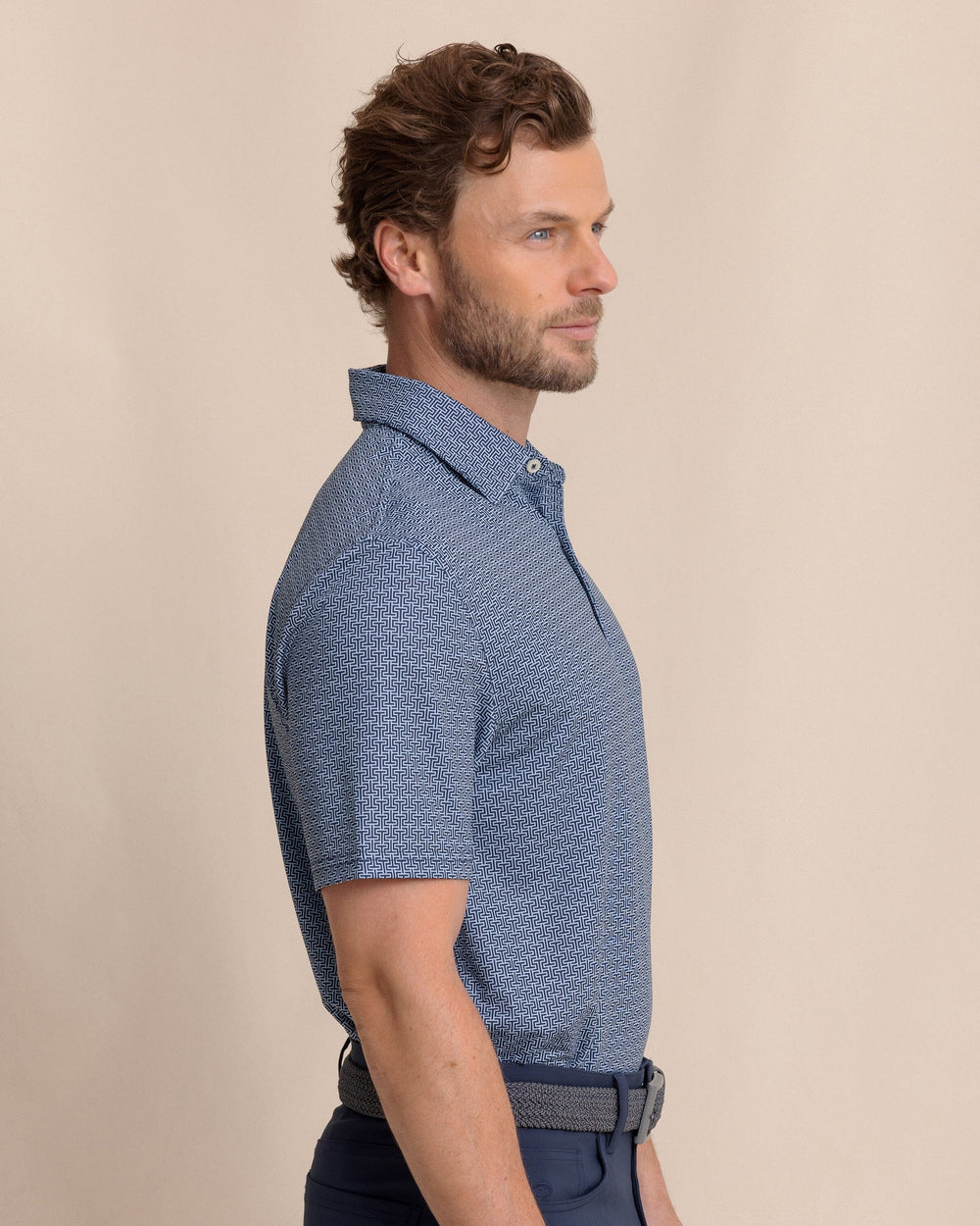 The side view of the Southern Tide Driver ST Geo Printed Polo by Southern Tide - Dress Blue