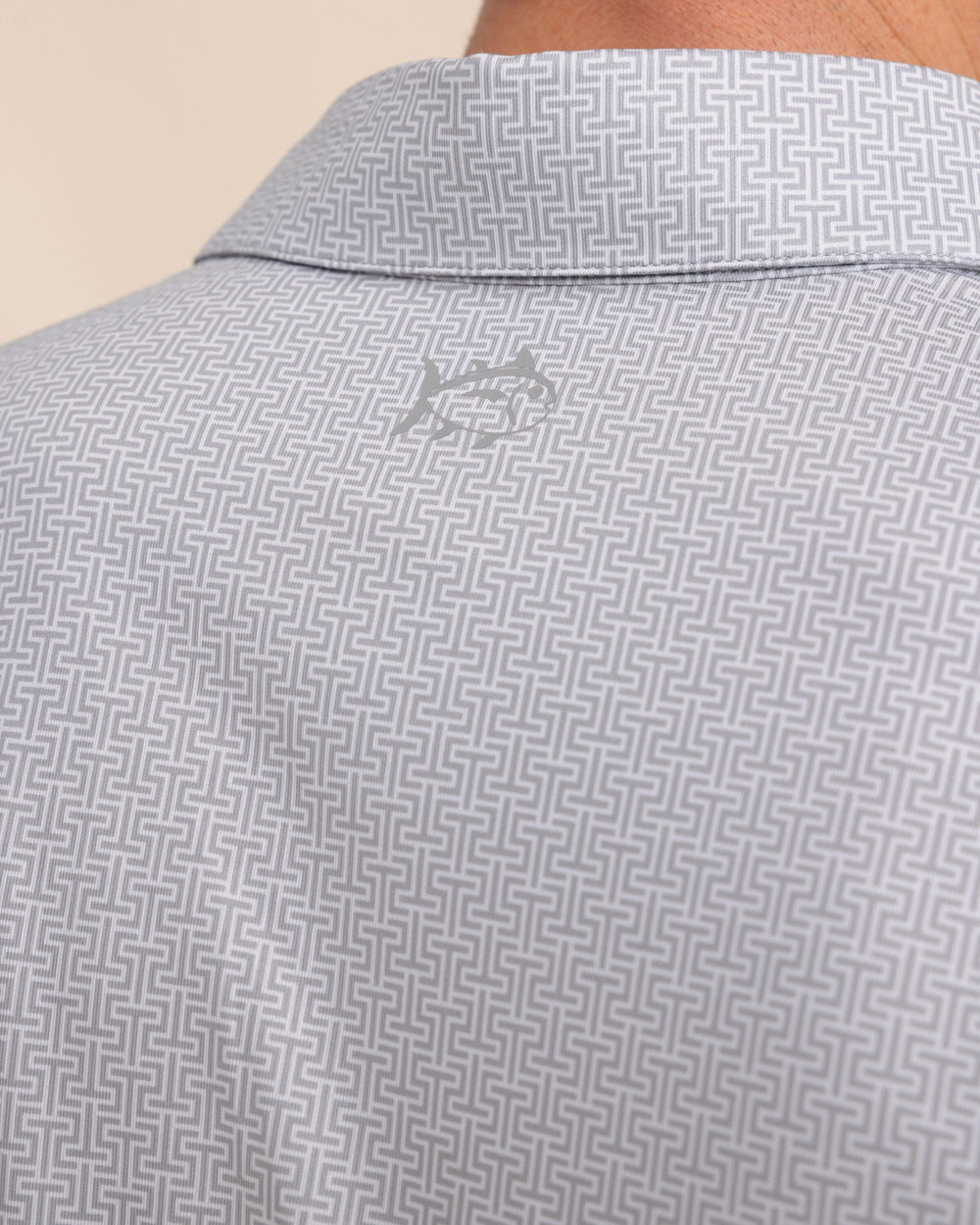 The detail view of the Southern Tide Driver ST Geo Printed Polo by Southern Tide - Steel