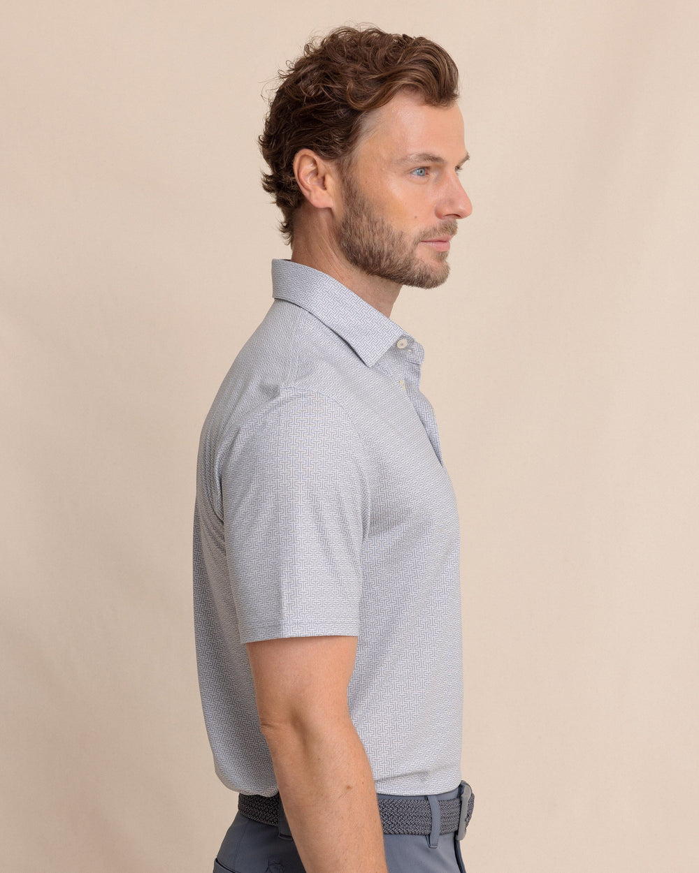The side view of the Southern Tide Driver ST Geo Printed Polo by Southern Tide - Steel
