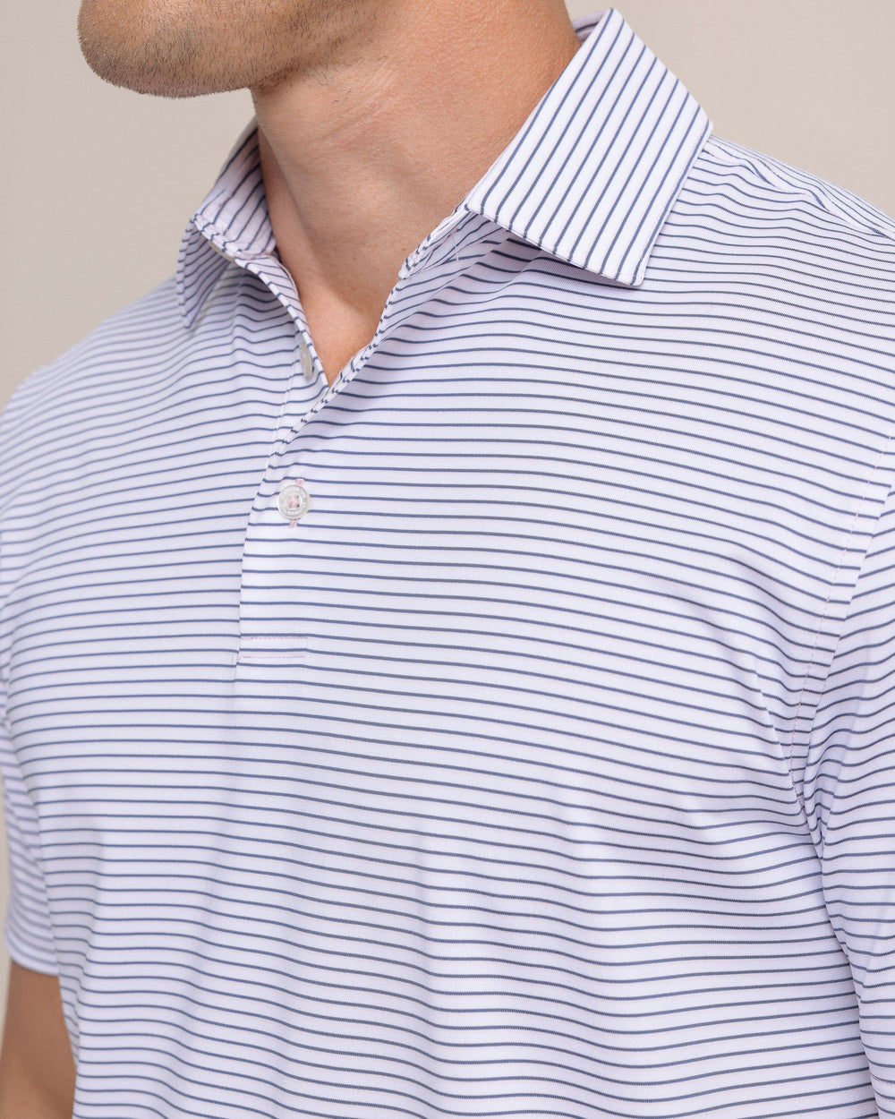 The front detail view of the Southern Tide Driver Sunbury Stripe Polo by Southern Tide - Classic White