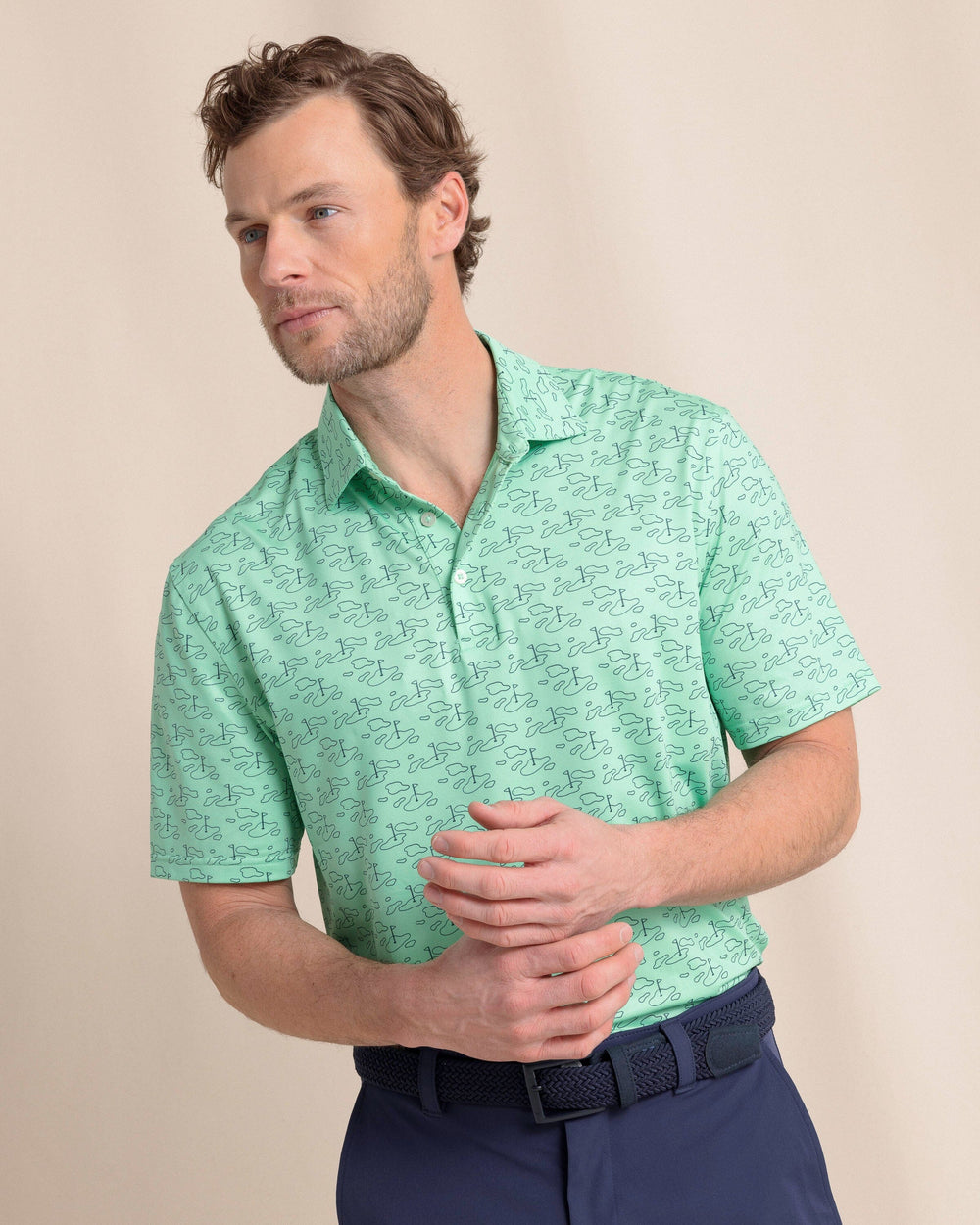 The front view of the Southern Tide Driver Who's Your Caddy Polo by Southern Tide - Jade Green