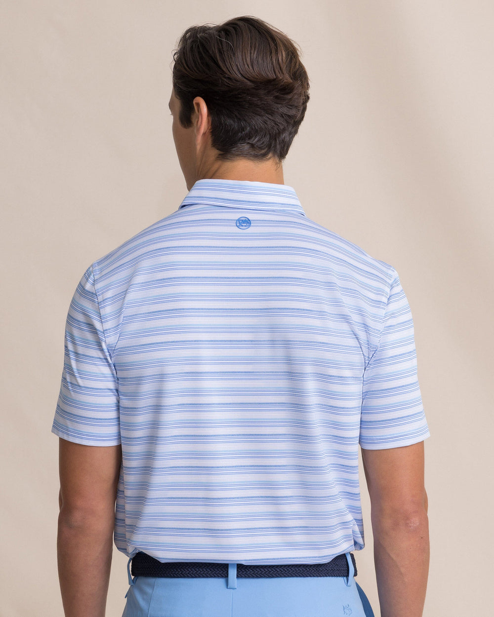 The back view of the Southern Tide Driver Wild Winds Stripe Polo by Southern Tide - Heather Blue Stream