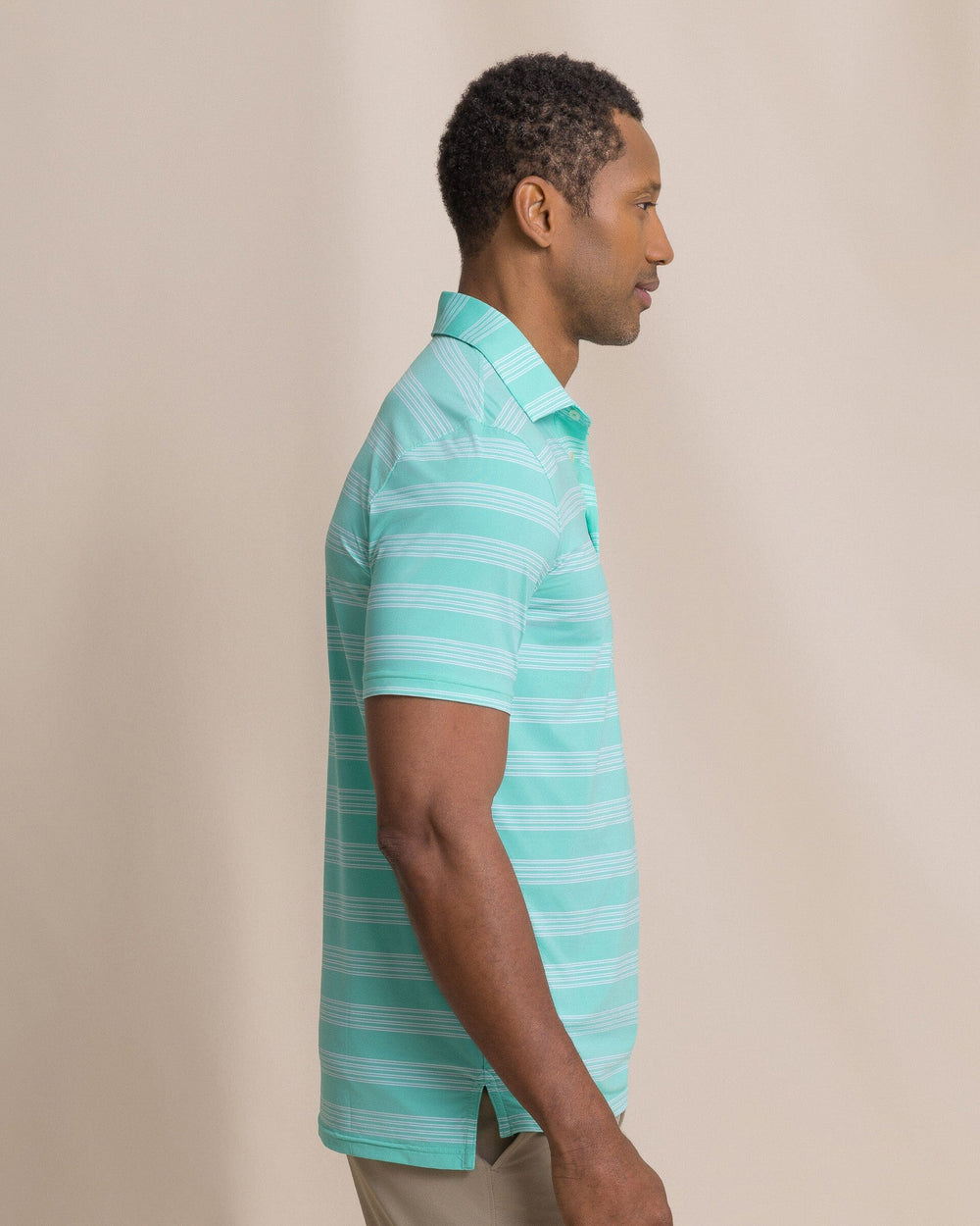 The side view of the Southern Tide Dune Crest Stripe Coastal Breeze® Performance Polo by Southern Tide - Florida Keys