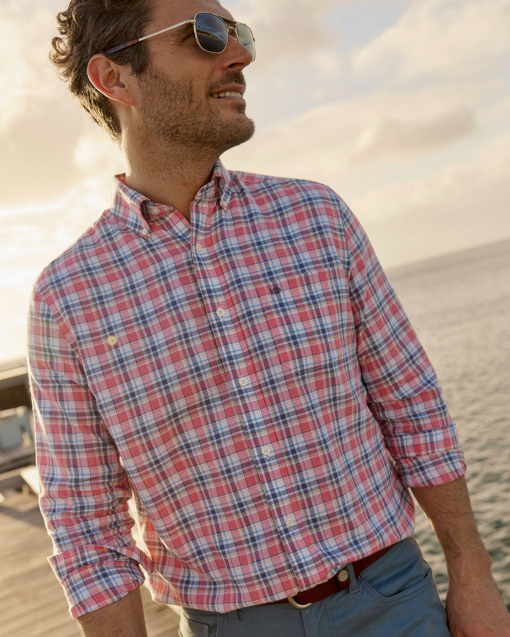 The lifestyle view of the Southern Tide Emerald Shores Plaid Headland Long Sleeve Sport Shirt by Southern Tide - Bubblegum