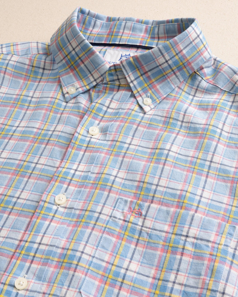 The detail view of the Southern Tide Emerald Shores Plaid Headland Long Sleeve Sport Shirt by Southern Tide - Cerulean