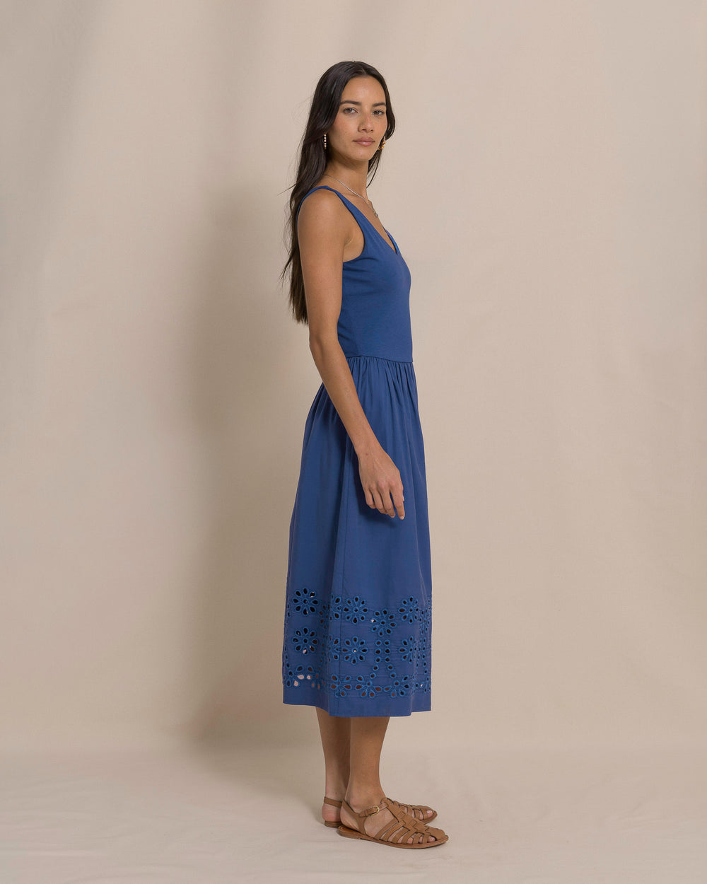 The side view of the Southern Tide Emilee Embroidered Solid Midi Dress by Southern Tide - Nautical Blue