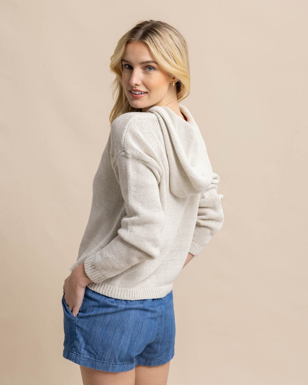The back view of the Southern Tide Everlee Hoodie Sweater by Southern Tide - Stone