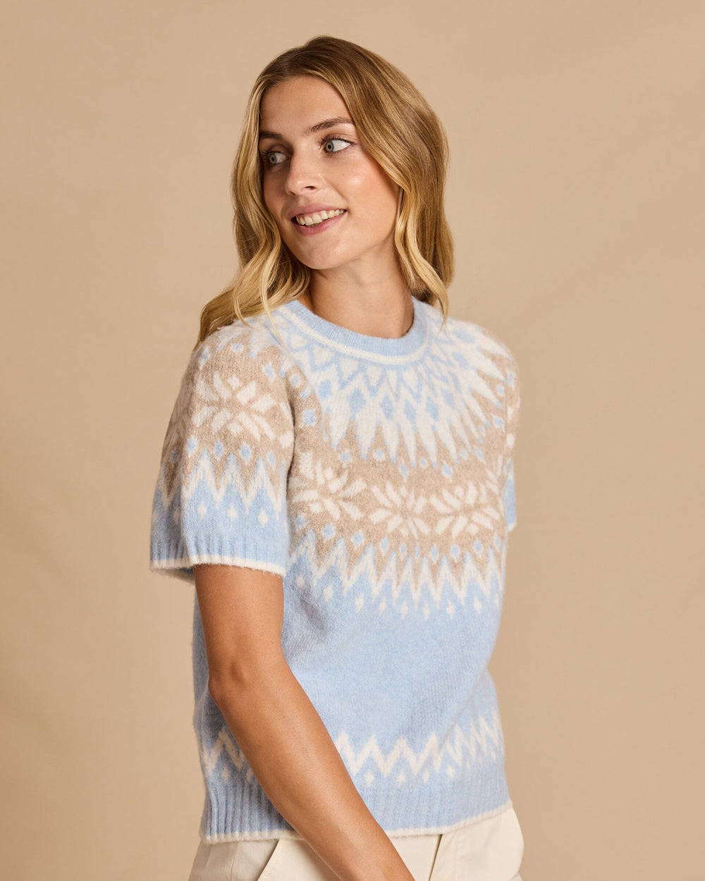 The side view of the Southern Tide Fair Isle Crewneck Short Sleeve Sweater by Southern Tide - Heather Ocean Channel