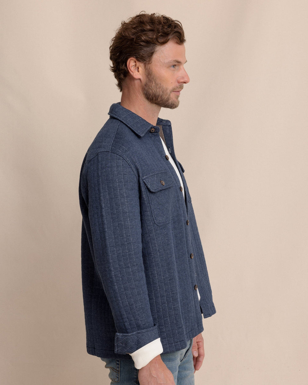 The side view of the Southern Tide Fairwood Quilted Knit Shacket by Southern Tide - Dress Blue