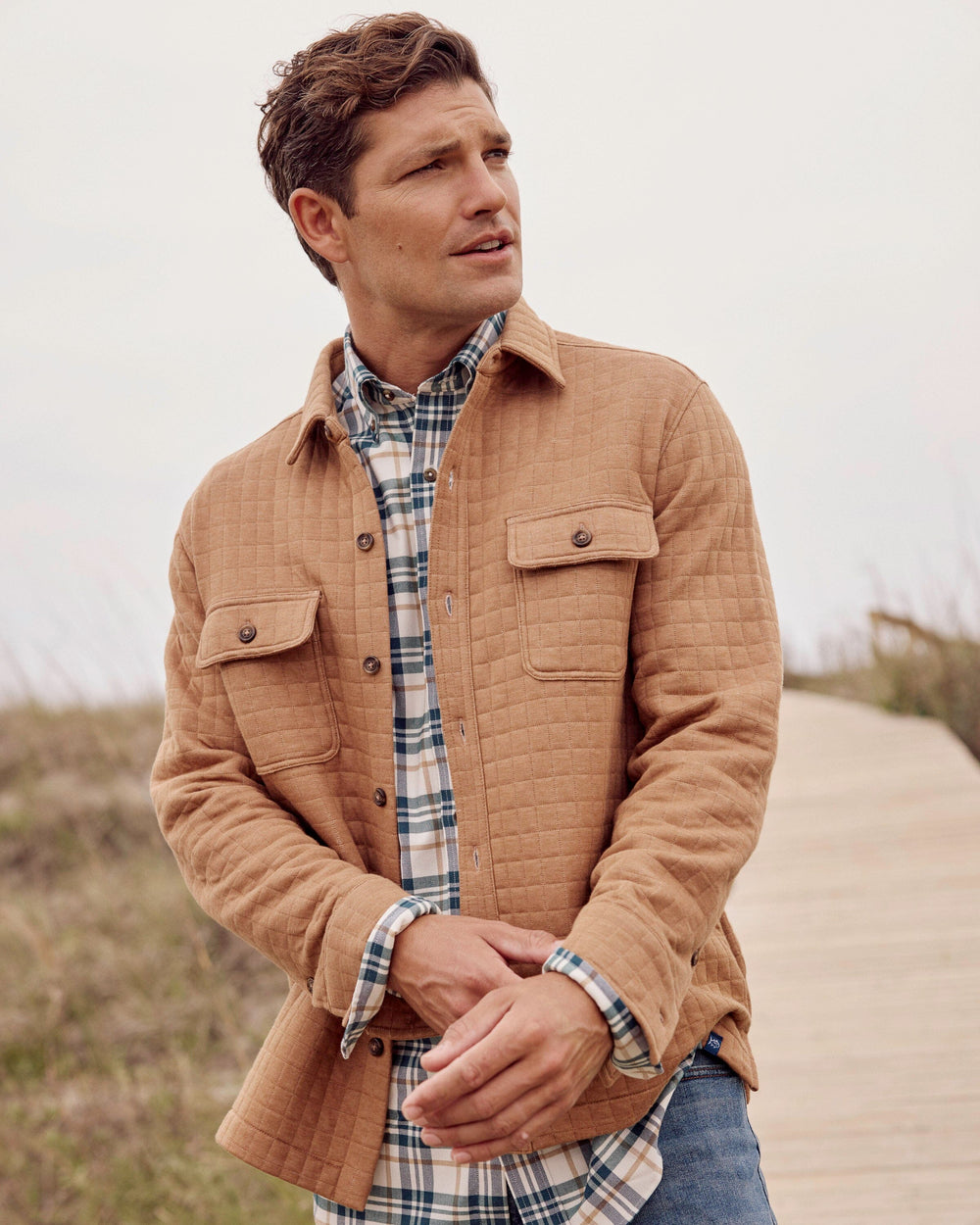 The lifestyle view of the Southern Tide Fairwood Quilted Knit Shacket by Southern Tide - Hazelnut Khaki