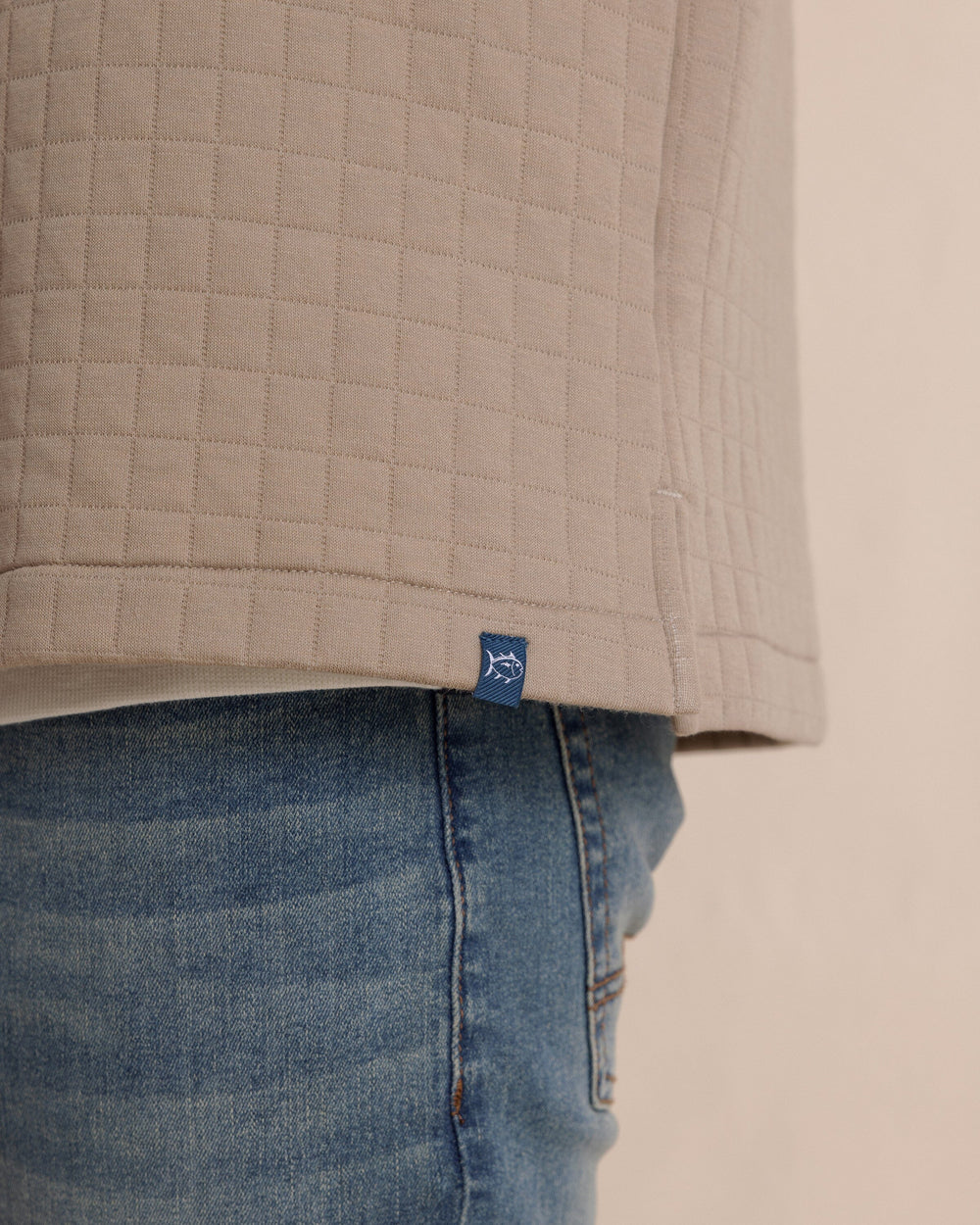The detail view of the Southern Tide Fairwood Quilted Knit Shacket by Southern Tide - Sandstone Khaki