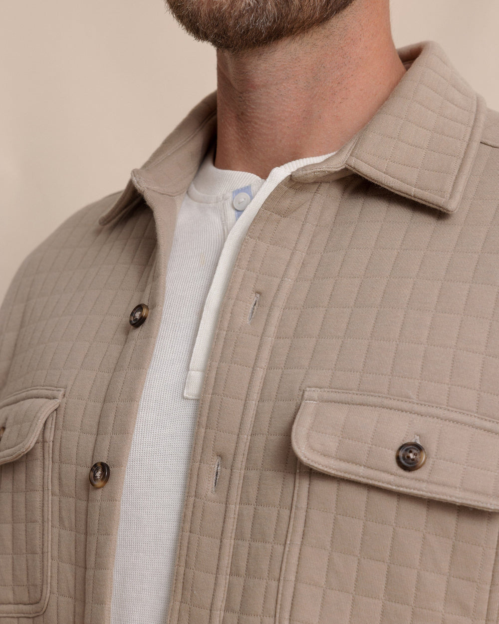 The detail view of the Southern Tide Fairwood Quilted Knit Shacket by Southern Tide - Sandstone Khaki