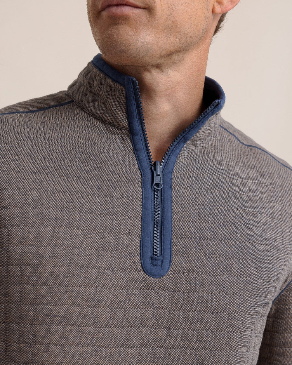 The detail view of the Southern Tide Fairwood Reversible Quarter Zip by Southern Tide - Dress Blue