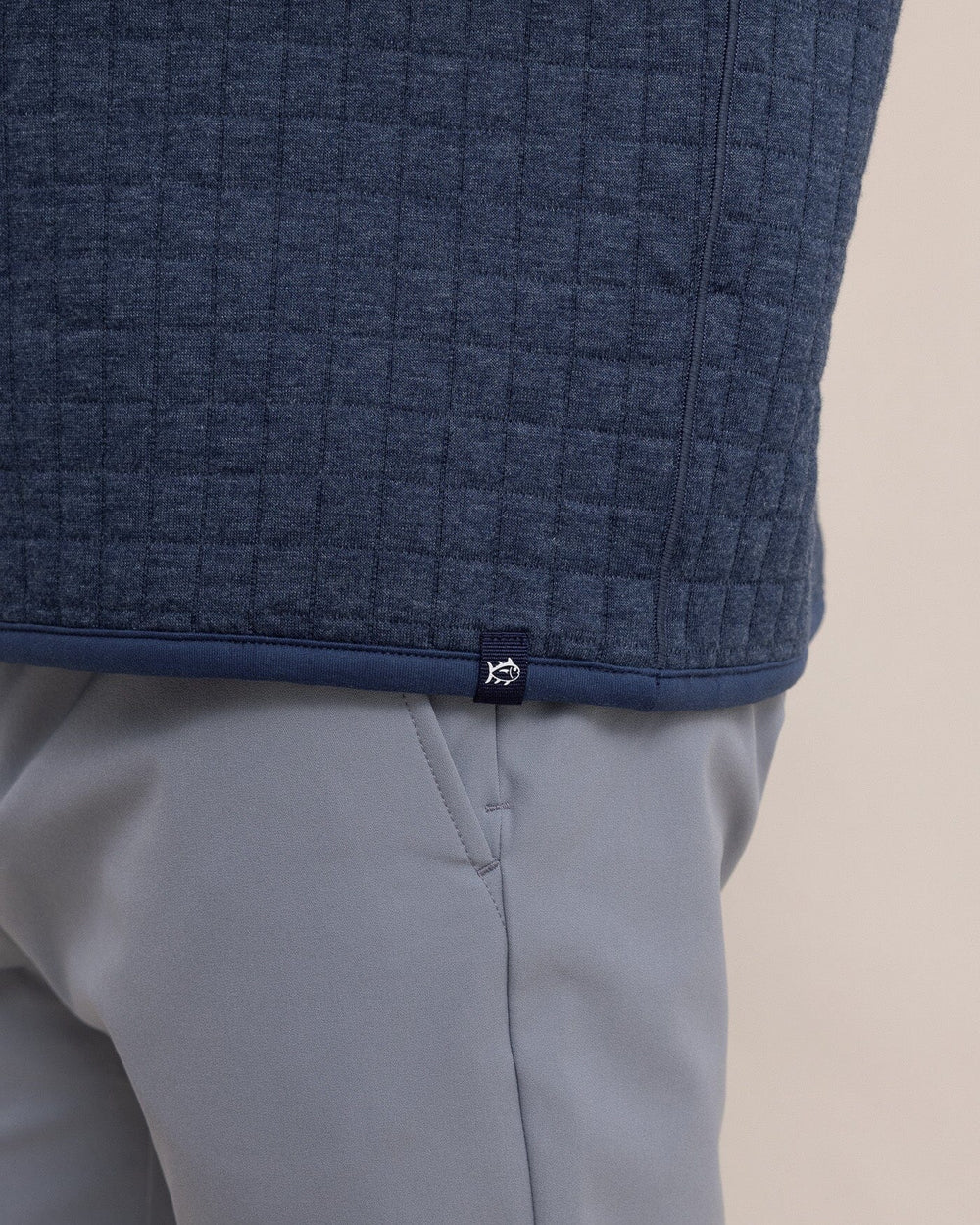 The hem view of the Southern Tide Fairwood Reversible Quarter Zip by Southern Tide - Dress Blue