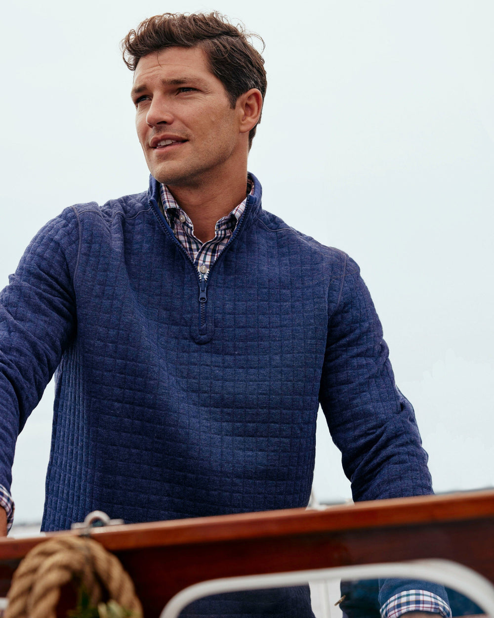 The lifestyle view of the Southern Tide Fairwood Reversible Quarter Zip by Southern Tide - Dress Blue