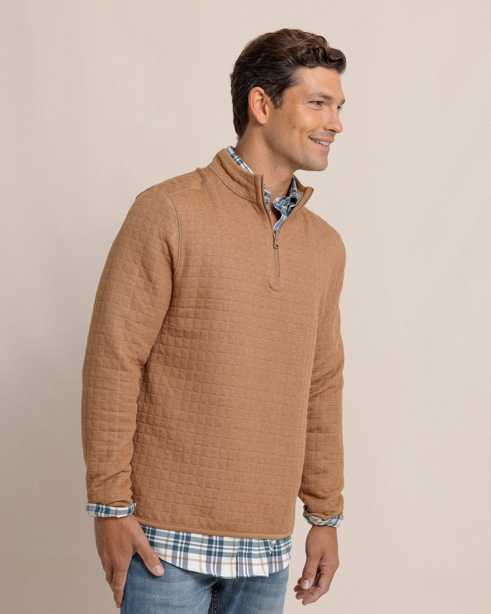 The side view of the Southern Tide Fairwood Reversible Quarter Zip by Southern Tide - Hazelnut Khaki