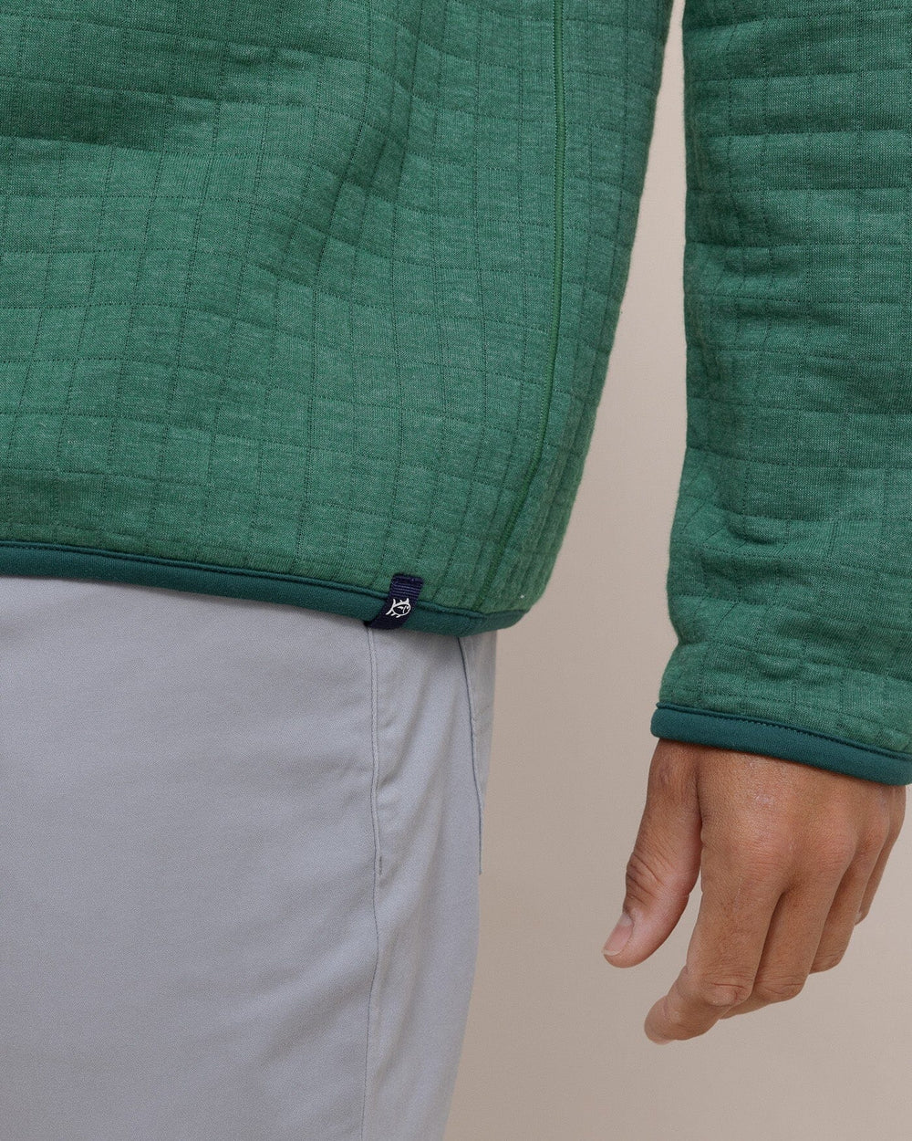 The hem view of the Southern Tide Fairwood Reversible Quarter Zip by Southern Tide - Salt Meadow