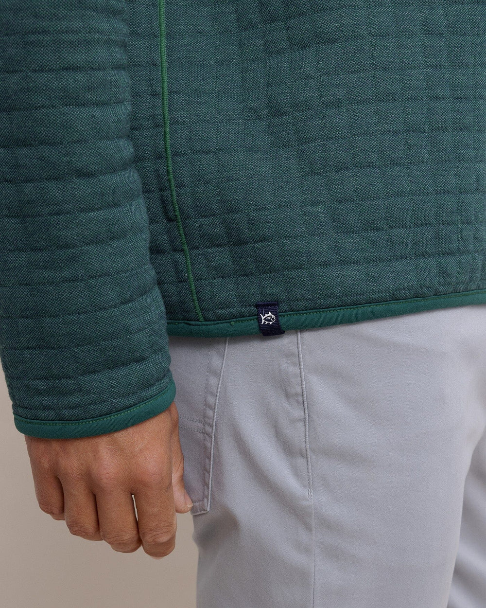 The hem view of the Southern Tide Fairwood Reversible Quarter Zip by Southern Tide - Salt Meadow