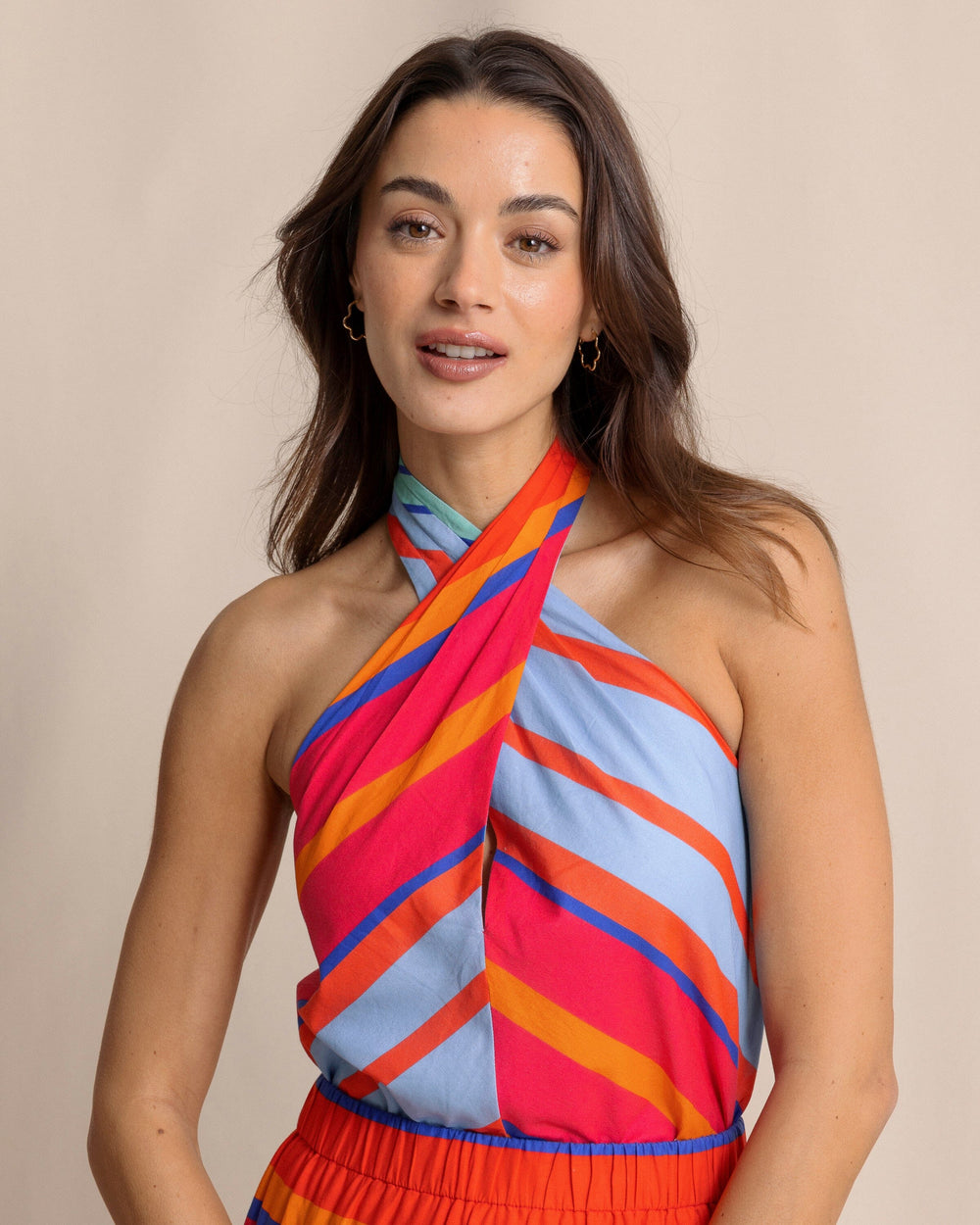 The front view of the Southern Tide Fallon Calypso Cay Stripe Halter Top by Southern Tide - Calypso Berry
