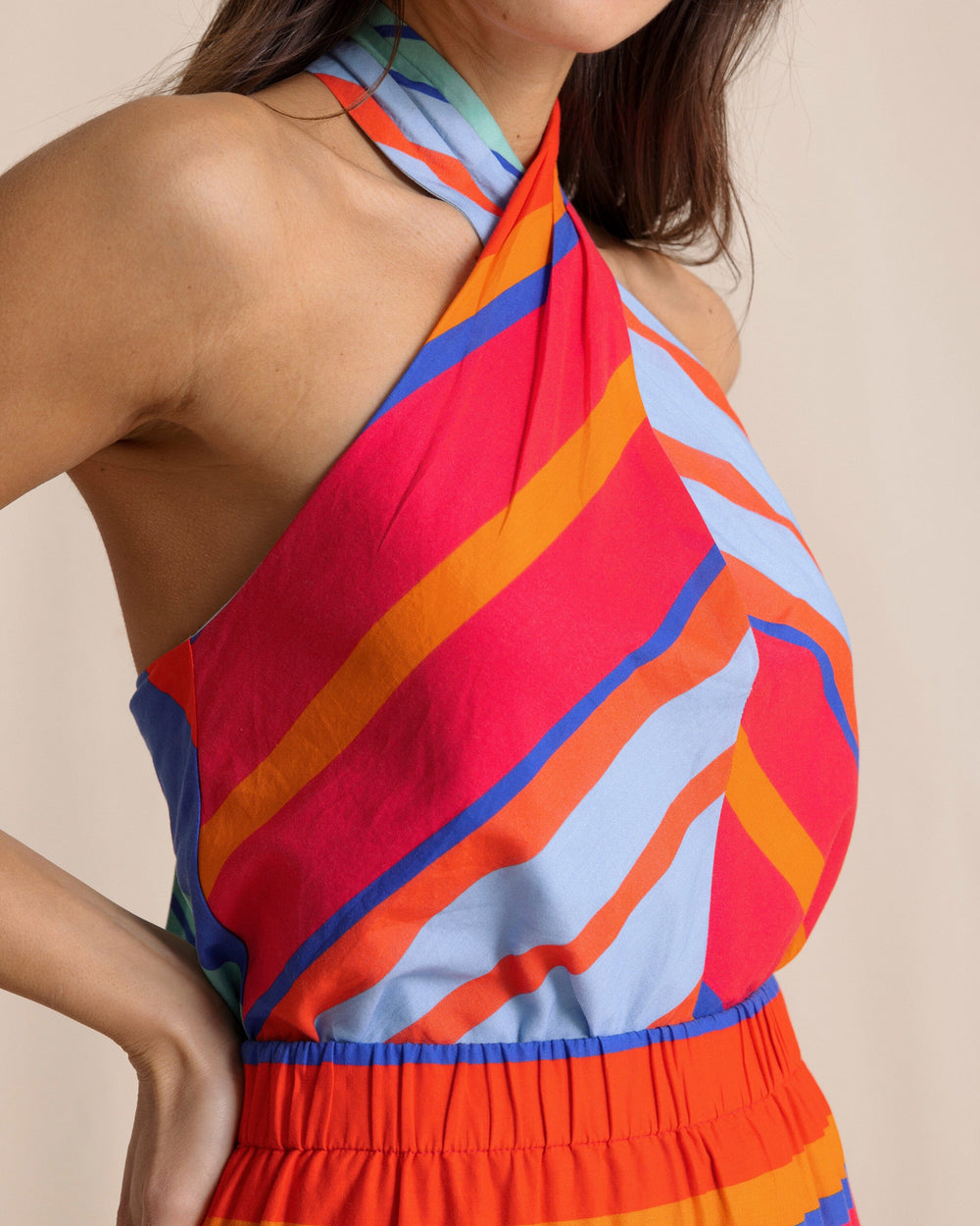 The front detail view of the Southern Tide Fallon Calypso Cay Stripe Halter Top by Southern Tide - Calypso Berry