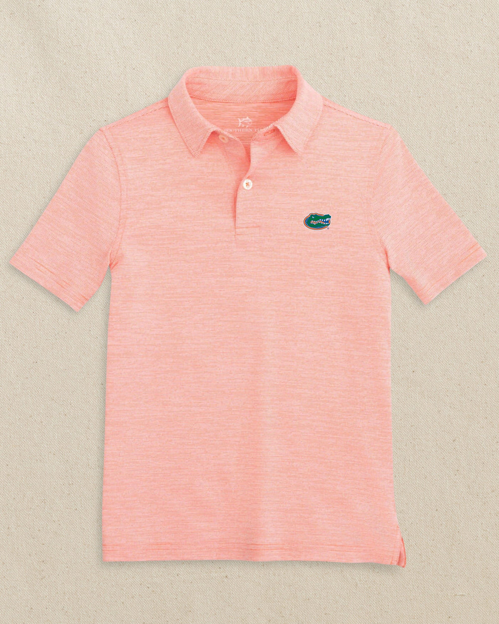 The front view of the Southern Tide Florida Gators Boys Driver Spacedye Performance Polo Shirt by Southern Tide - Endzone Orange