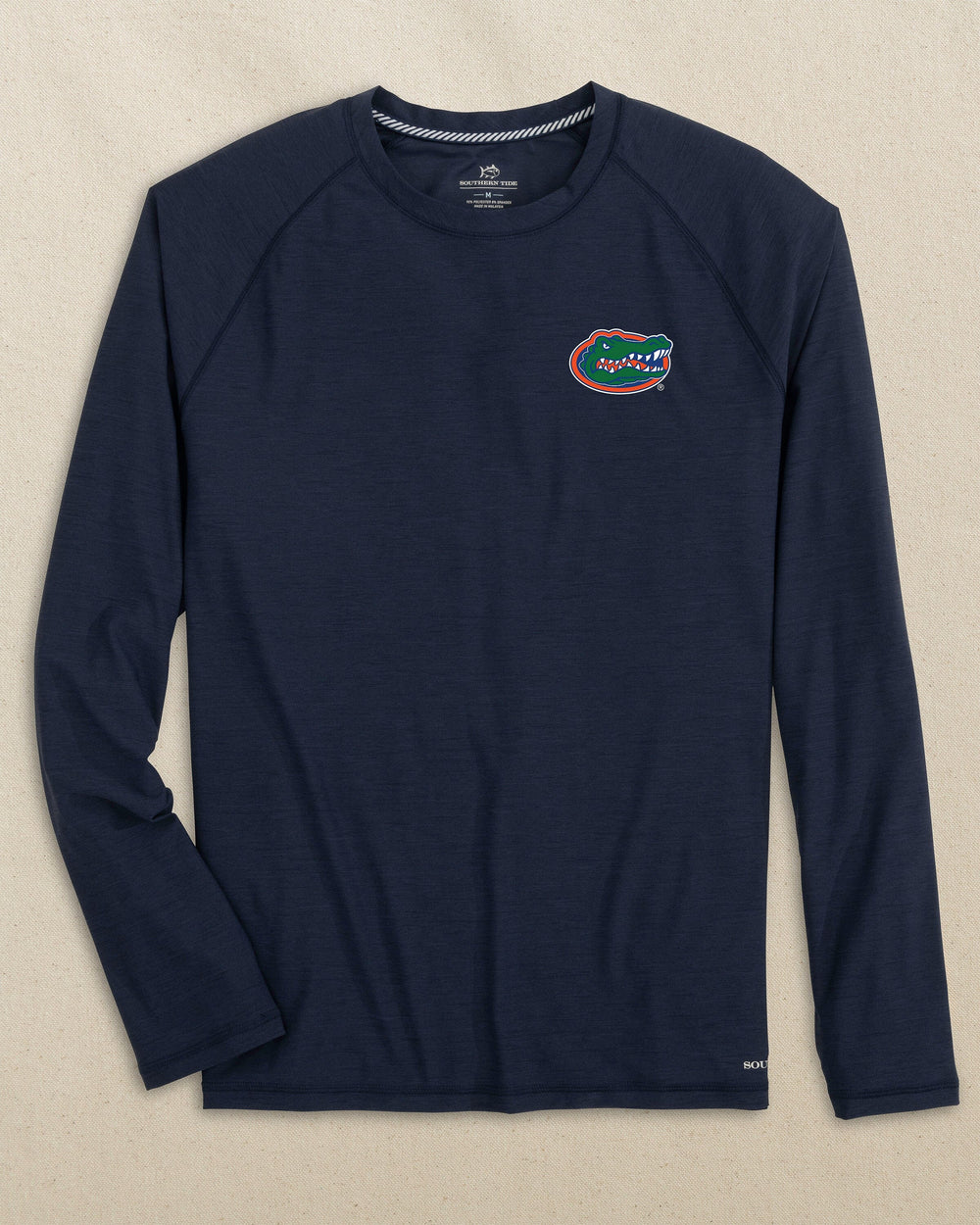 The front view of the Southern Tide Florida Gators brrr°®-illiant Performance Long Sleeve T-Shirt by Southern Tide - Nautical Navy