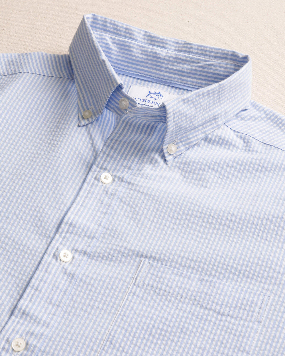 The detail view of the Southern Tide Folly Field Stripe Seersucker Short Sleeve Sport Shirt by Southern Tide - Ocean Channel