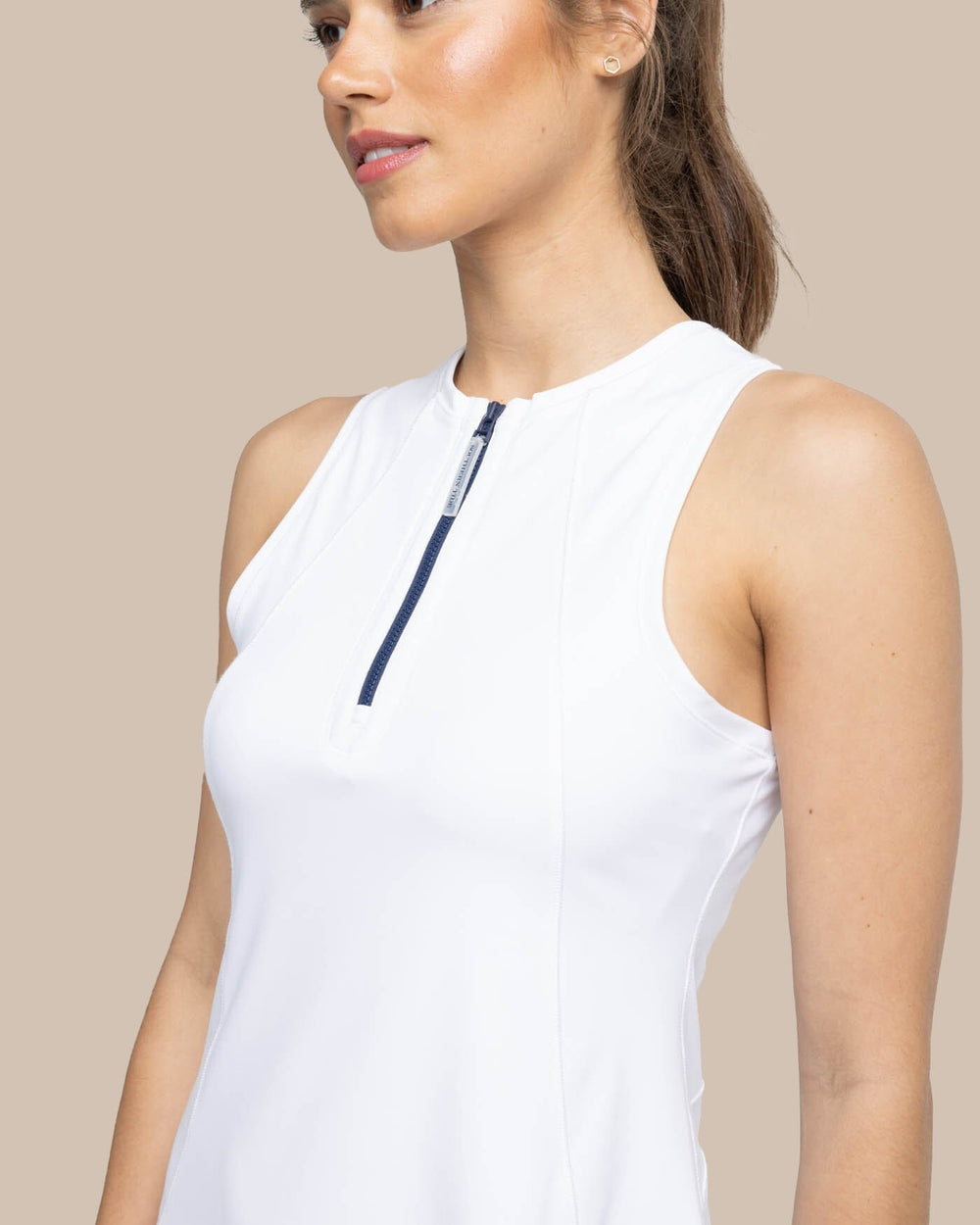 The detail view of the Southern Tide Frances Zip Front Performance Dress by Southern Tide - Classic White