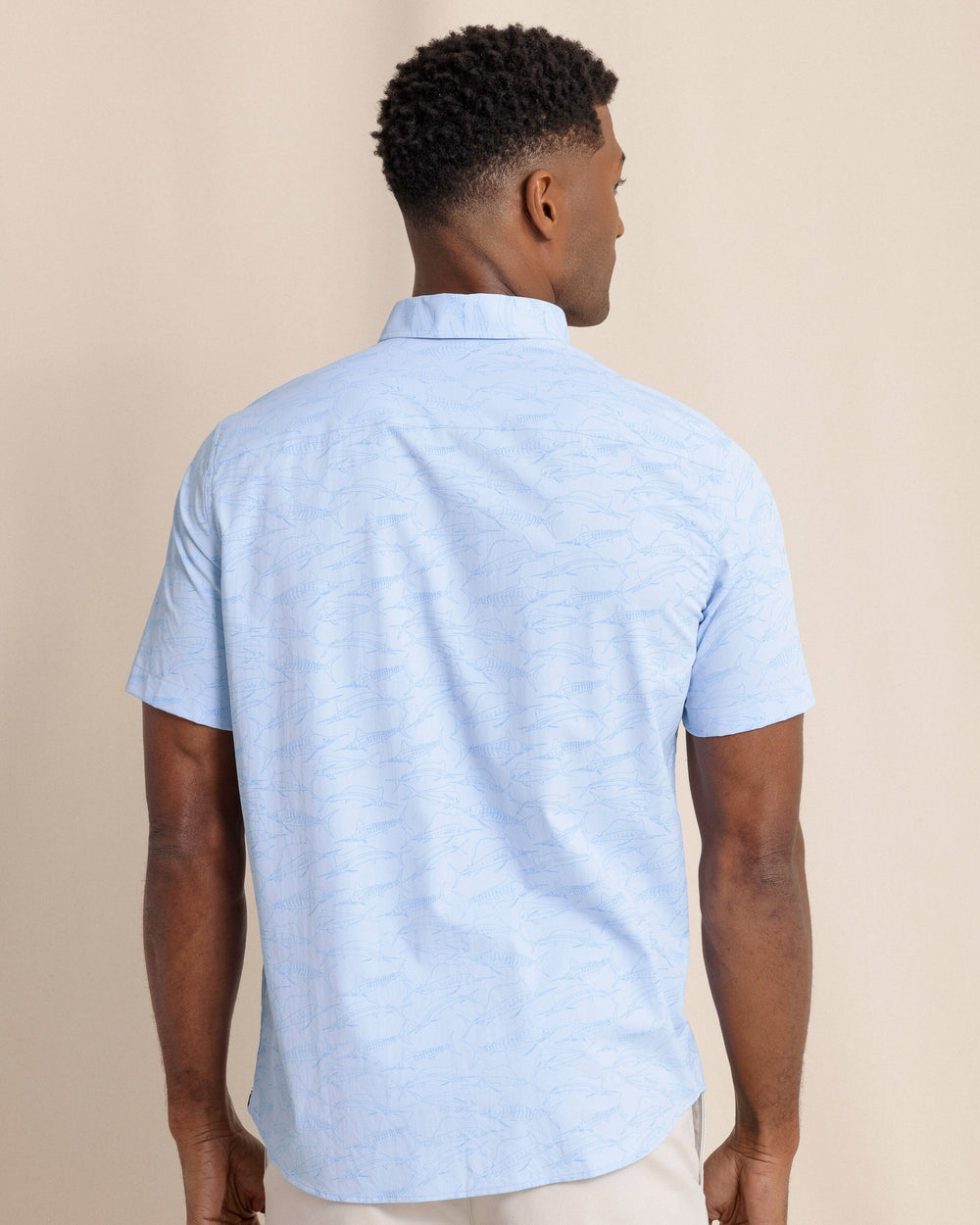The back view of the Southern Tide Game Fish Intercoastal Short Sleeve Sport Shirt by Southern Tide - Cerulean
