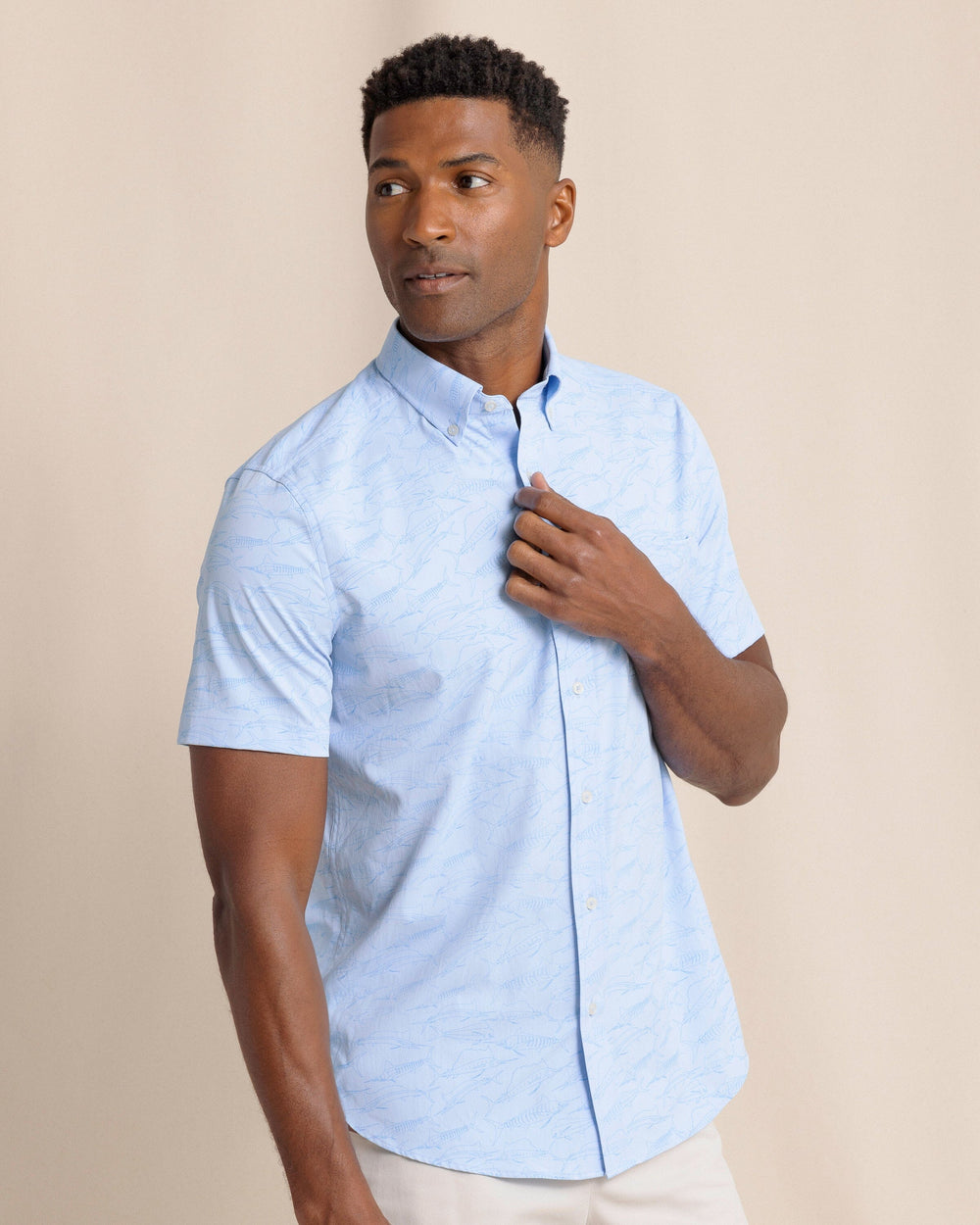The front view of the Southern Tide Game Fish Intercoastal Short Sleeve Sport Shirt by Southern Tide - Cerulean