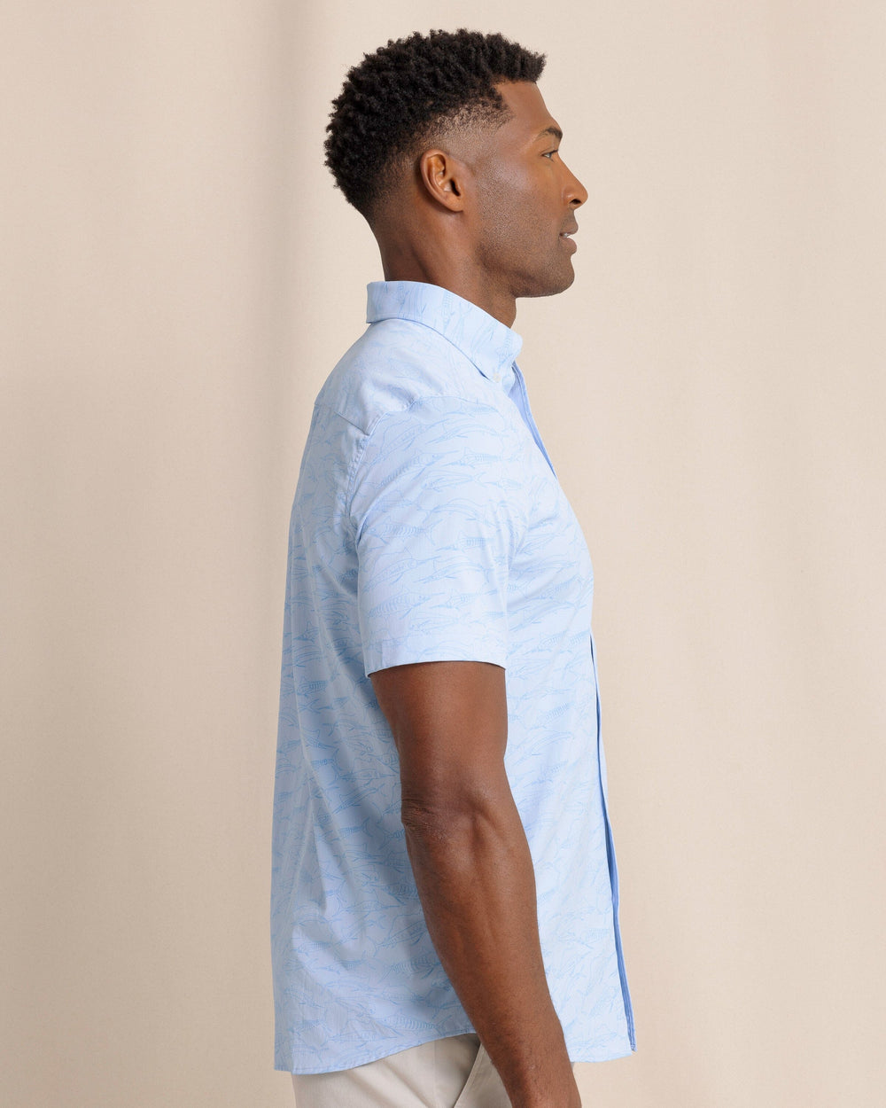 The side view of the Southern Tide Game Fish Intercoastal Short Sleeve Sport Shirt by Southern Tide - Cerulean
