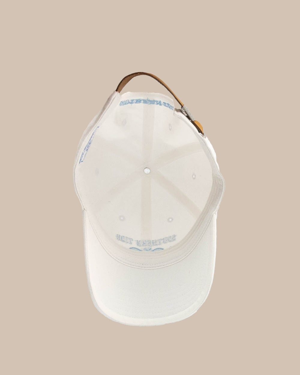 The detail view of the Southern Tide Game Set Match Leather Strap Hat by Southern Tide - White