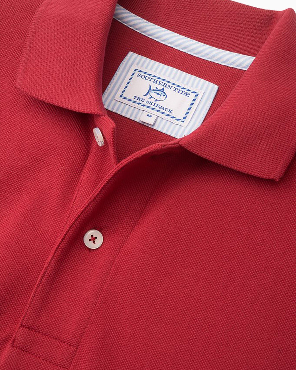 The detail view of the Men's Red Skipjack Gameday Colors Polo Shirt by Southern Tide - Crimson