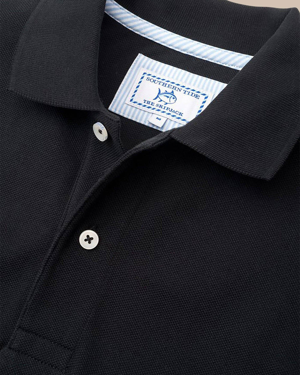 The detail view of the Southern Tide Alabama Crimson Tide Pique Polo Shirt by Southern Tide - Black